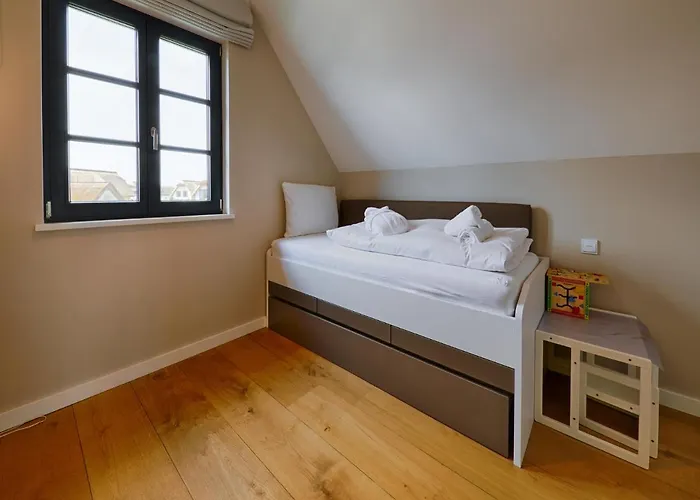 Дом отдыха Reetland Am - Premium Reetdachvilla Mit 3 Schlafzimmern, Sauna Und Kamin F28